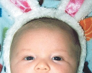 Wesley Clowser is just 3 months old when he borrowed the Easter Bunny's ears this year.