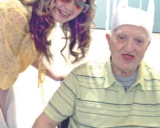 Katrina Wolfe of Columbiana sent in this photo of her daughter, KayLee Whistler, 14, and her father, Daniel Wolfe Sr., 75, from Easter 2012. That Easter outing and dinner was her father's last one, as he passed away in July 2012, and it was memorable. Katrina writes, "He came rolling around the corner with these handmade Easter bunny ears. We couldn't stop laughing!"