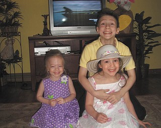 Logan, Erin and Caitlin Rowland from Liberty Township are at grandma's house for Easter 2012.