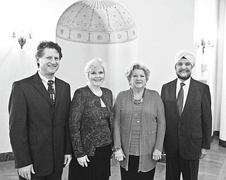 Robert K. Yosay | The Vindicator
American Heart Association’s 2013 Heart Ball will be April 27 at Stambaugh Auditorium in Youngstown, and will honor three community leaders. From left are Dr. Jason R. Delatore, honoree; Dr. Nancy Landgraff of YSU, chairwoman; and Celia Ciarniello and Dr. Amarjeet S. Nagpaul, honorees.