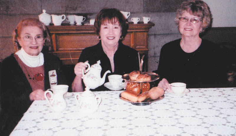 SPECIAL TO THE VINDICATOR
Austintown Historical Society is sponsoring its 23rd Spring Tea on April 21 at the Strock Stone House, 7171 Mahoning Ave., Austintown. Enjoying a cup of tea while making plans are, from left,  Rae Jeanne Mollica, Marge Goldner and Joyce Pogany. Seatings will be at noon, 2 and 4 p.m., and the menu will include coffees and teas, finger sandwiches, scones, pastries and items of a traditional high tea. Tickets are $14 per person and $7 for children under 12; reservations are required by Friday. Make checks payable to Austintown Historical Society, and mail to 1181 S. Raccoon Road, Austintown, OH 44515, or call Pogany at 330-792-1129. There will be a basket raffle; winners do not need to be present to win. Free tours of the stone house will be conducted after each seating. 