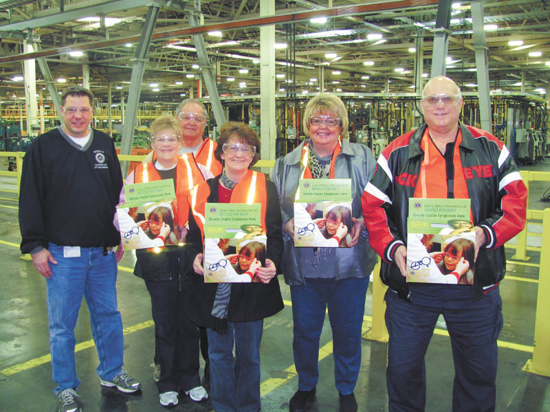 SPECIAL TO THE VINDICATOR
Boardman Lions Club will extend its eyeglass collection effort through a partnership with the Lordstown General Motors Plant, placing five collection boxes inside through the efforts of United Auto Workers Local 1714 President Dave Green, also a Boardman Lion. The boxes are located at Lordstown’s main entrances and at the safety department. More than 1,750 pairs of glasses have been collected by the club since September to be redistributed through LensCrafters to those in need. Green, left, gave a tour of the plant to Lion members Betsy Koch, Henry Koch, Patti Shears, Terri Wilkes and Ron Paris.