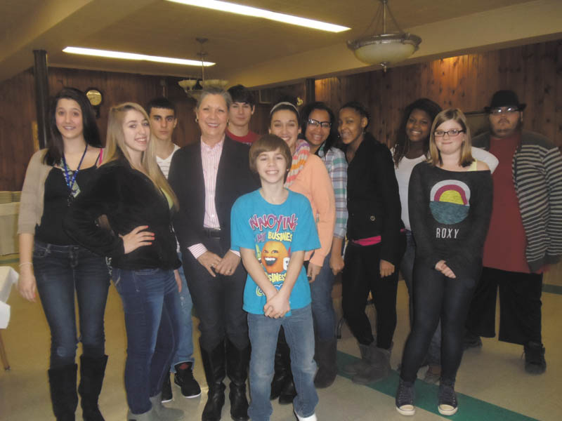 SPECIAL TO THE VINDICATOR
Isabel Seavey, a member of Mahoning Valley Organizing Collaborative’s Human Trafficking Core Team, recently spoke to members of the Velocity Youth Group of Full Covenant Tabernacle. She educated teens on the dangers of human trafficking and the signs that someone may be a perpetrator or a victim. Some of those participating were Lauren Carr, left, Justyce Guinn, Zachary Ramsey, Seavey, Brandon Laurenzi, Christian Guinn, Courtney Matthews, Alissia Brown, Janiera Brooks, Quin’yotae Brantley, Guinevere Greathouse and Zechariah Gerthung. The youth group meets at 7 p.m. Wednesdays at 234 E. Market St., Warren. For information call Jennifer Campbell at 330-219-9819.
