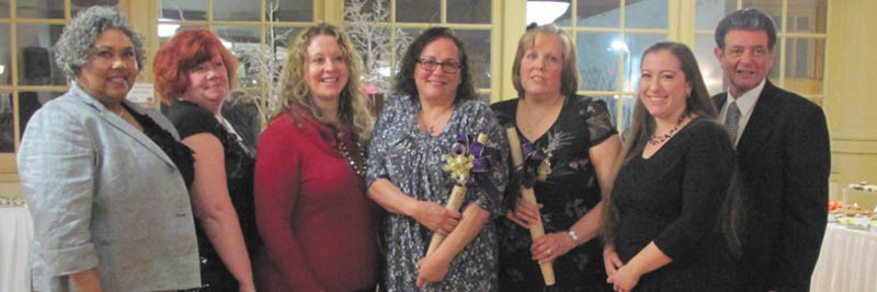 SPECIAL TO THE VINDICATOR
Mahoning Valley Historical Society featured its Cookie Table and Cocktails event recently at Tyler History Center. The event raised more than $8,500 for new exhibits and educational programs. Winners were, from left: Anita Koch, third place amateur for Swedish almond raspberry cookie; Kimberly Barrett, second place amateur for salted caramel cookie tart; Christine Restle, first place amateur for Russian torte; Cindy Novak, judges amateur for French macaroon; Kim Brothers of Kookies by Kim, judges professional for lemon tart, and second place professional tie for coconut cream tart; Sara Hendel-McCormick of Brew Bakes, third place professional for chocolate peanut butter barley cookie; and Frank Rulli of Rulli Bros., second place professional tie for Italian pecan ball. Missing is Nancy Faulkner of Cookies to Go, who won first place in the professional category.