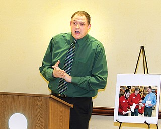 ODOT District 4 spokesman Justin Chesnic tells news reporters Thursday about upcoming Mahoning Valley road
construction projects.