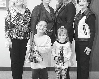 NICK MAYS | THE VINDICATOR
Angels of Easter Seals is preparing for its 36th annual spring luncheon and style show “Springtime in Paris” set for May 9 at Mr. Anthony’s in Boardman. Easter Seals children holding model Eifel towers are Makavelli Emmert, left, and Alyssa Bierig. In back are Pattie Ceglie, Geri Kosar and Bethann Zoldan, chairpersons of the event; and Joan Zarlenga, president of Angels 2013.