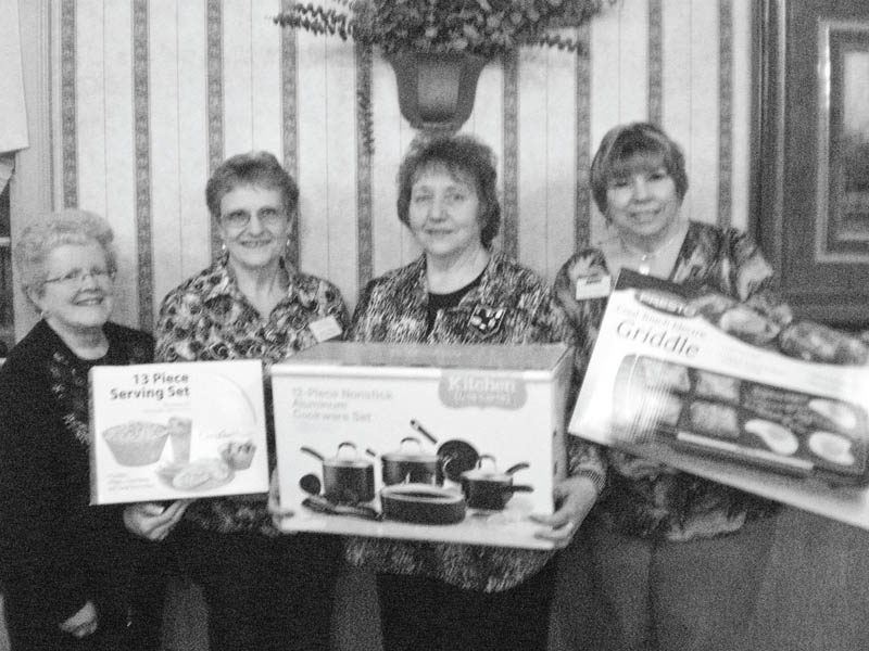 SPECIAL TO THE VINDICATOR
The annual basket auction for Mill Creek Chapter of American Business Women’s Association will be from 12:30 to 4 p.m. April 28 at the Ursuline Center, 4280 Shields Road, Canfield. Members showing sample gifts are, from left, Judy Codespote, Jackie Fischio, Kathy Novak and Marilyn Abramski. Doors will open at 12:30 with drawings starting at 3. Ticket holders are entitled to free refreshments. There will be gifts for children, men and women and special raffles of items greater than $25. The donation for a ticket is $5 and can be purchased at the door. Call Codespote at 330-502-9413 for tickets before the event. All proceeds will go to the education fund, which sponsors youth  attending Youngstown State, Kent State and John Carroll universities.
