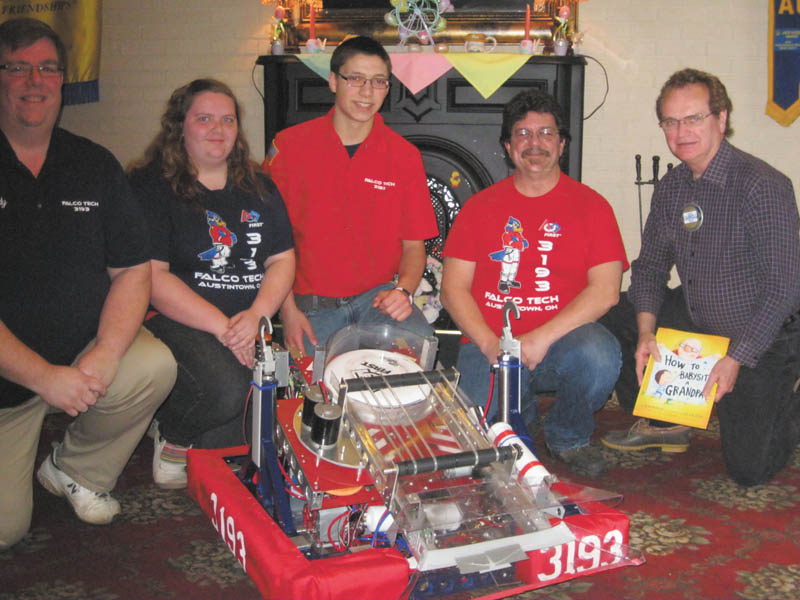 SPECIAL TO THE VINDICATOR
Members and advisers of Austintown Fitch Robotics Team visited Rotary Club of Austintown during a recent meeting. Eileen Yantes and Wesley Pringle demonstrated the 2013 robot, a Frisbee-tossing machine. It won awards at various competitions. The group had 27 participants this year. They have six weeks to build their entry. Worldwide there are 2,143 teams and the Austintown team shares and cooperates with teams from Warren, Girard and Canfield. The school provides a work space but the teams must raise funds to build the units. From left are Jim Yantes, adviser; Eileen and Wesley, students; Ric Zimmerman, adviser; and Ron Carroll, Rotary president.