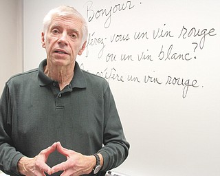 Ron Saffell talks about the conversational French course he teaches at Youngstown State University’s Metro College in Boardman. Spanish, Italian and Arabic also are taught at the Southwoods Commons location.