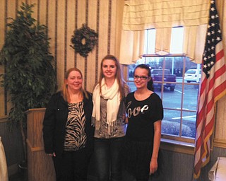 SPECIAL TO THE VINDICATOR
Kiwanis of Western Mahoning County heard presentations from two members of the Jackson Milton speech team at a recent meeting. Speech team coach, Janet Yontes, left, explained the schedule of a team member and a short history of the speech and debate team. Speech team members are Greta Frost, center, and Aurora Schaefer. Kiwanis meets at 6 p.m. Wednesdays at A La Cart in Canfield. The club serves Canfield, Berlin Center, Ellsworth, North Jackson and Lake Milton. For information contact Barb Smith at 330-502-1460 or cfsmith99@yahoo.com.
