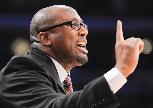 Mike Brown gestures during a Los Angeles Lakers game against the Chicago Bulls in Los Angeles. The Cavaliers intend to speak with Brown, who was fired by the Lakers earlier this season, about returning to Cleveland. Brown was fired by Cleveland three years ago after five seasons as head coach.
