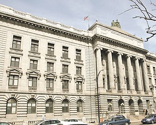 Mahoning County commissioners will advertise for new architects and engineers to restore the county courthouse on Market Street.