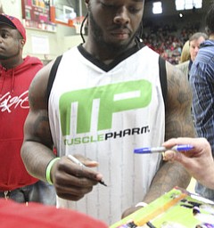 William D. Lewis\The Vindicator Cleveland Browns Trent Richardson signs autographs during Comeback event 4-27-13 in Struthers..