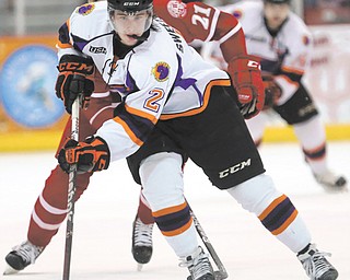 The Phantoms’ Eric Sweetman breaks away from John Stevens of the Fighting Saints during Game 1 of the USHL Eastern Conference final on Friday at the Mystique Community Ice Center in Dubuque, Iowa. Youngstown thought it scored late in Saturday’s Game 2, but the goal light did not go on in the 3-1 loss.