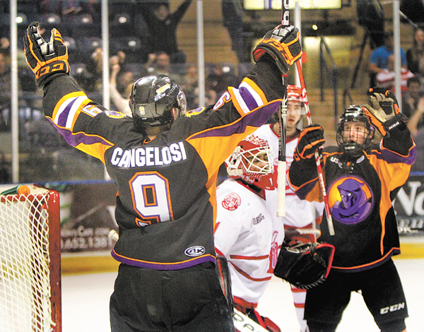 The Phantoms’ Austin Cangelosi (9) and Cam Brown (8) celebrate after Cangelosi cored Youngstown’s first
goal against Dubuque during the first period of Game 3 of the USHL Eastern Conference final on Monday at
the Covelli Centre. Down 3-1 after two periods, the Phantoms rallied, scoring three goals in the final period
to win 4-3 and avoid elimination. Dubuque leads the series, 2-1. Game 4 is tonight.