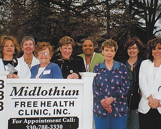 Maureen Cronin, executive director of the Midlothian Free Health Clinic in Youngstown, submitted this photo of "Dr. Albani's Angels." Under the supervision of Dr. Thomas Albani and other physicians, these women "work endless hours providing quality health care to the uninsured of the Youngstown area," she writes. The doctors and nurses volunteer their time. Pictured are, from left, head nurse Carol Beard, Jerri Smith, Kathleen Berry, Jean Slenker, Annette Carnie, Robin McCaulley, Sandra Reel, Amy Stanovcak, Anna Lynch and Virginia Petefish. All are RNs, except for Robin, a student LPN. Missing are Bridget Romeo, CNP; Majorie Betts, Marlene Carney, Debbie Hromyak, CNP; Tila Miller, Becky Tareshawty, Nellie Tucker, Carol Dumas and Jenna Cicchillo, CNP. All not identified as a CNP are RNs.