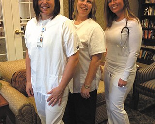 Tristess Patrick, left, Marie Turner and Brianna Carpenter are all nurses at Windsor House at Champion Estates Assisted Living in Warren. Not pictured are Nuri Reed and Sarah George. The photo was taken by Krista Reese, director at the facility, and submitted by Dan Rowland, director of marketing.