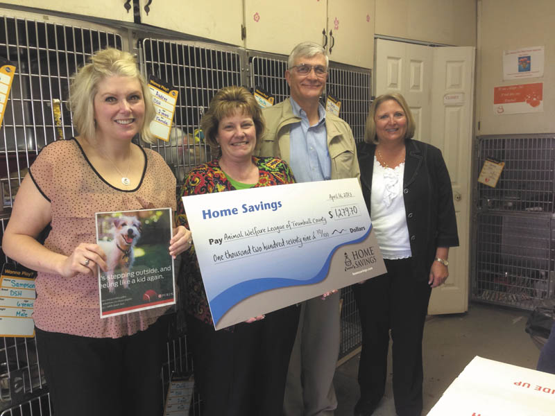 SPECIAL TO THE VINDICATOR
Home Savings offices in Trumbull County recently hosted bake sales and presented $1,279.70 to Animal Welfare League of Trumbull County. From left to right are Desirae Monaco, Home Savings Howland office; Kim Gennaro, Home Savings Liberty office; Dr. Jeff Williams, president of Animal Welfare League; and Colleen Miller of Home Savings McDonald. The Animal Welfare League works to reduce suffering and improve the lives of animals.