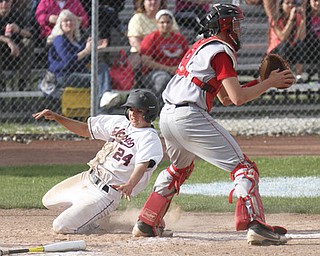 William d Lewis the vindicator Fitch's Shane Vitullo(24) scores as Niles catcher Ian Hileman(4) waits for the throw. Fitch won 1-0.