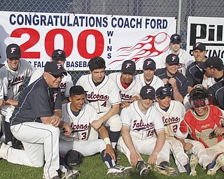 William d Lewis the vindicator Fitch Basebll coach wally Ford, left, and his team celebrate Ford's 200th career win after beating Niles 1-0 at Fitch 5-6-13.