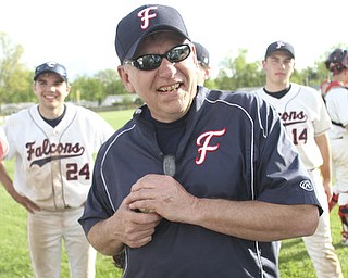 William d Lewis the vindicator Fitch Basebll coach wally Ford and his team celebrate Ford's 200th career win after beating Niles 1-0 at Fitch 5-6-13.