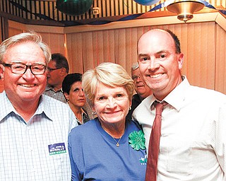 John McNally, right, celebrates his win with dad and mom, John McNally III and Jeanne McNally, at the Golden Dawn on Wick Avenue on Tuesday night. McNally won a very tight race in the Democratic primary for Youngstown mayor against Jamael Tito Brown and Matthew Smith.