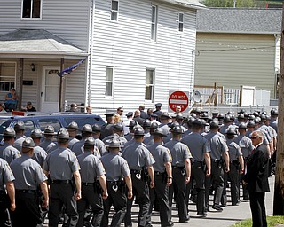 MADELYN P. HASTINGS | THE VINDICATOR
Hundreds of police officers leave the funeral service of Shenango Township Police Officer William “Jerry” McCarthy who was killed by Kylee Barletto in a car chase on May 2, 2013.