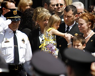 MADELYN P. HASTINGS | THE VINDICATOR
Mourners leave St. Vitus Church in New Castle after the funeral service for Shenango Township Police Officer William “Jerry” McCarthy outside of St. Vitus Church on May 8, 2013. McCarthy was killed by Kylee Barletto in a car chase on May 2, 2013.