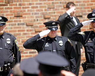 MADELYN P. HASTINGS | THE VINDICATOR
Shenango Township police officers mourn the death of Officer William “Jerry” McCarthy after his funeral service outside of St. Vitus Church on May 8, 2013. McCarthy was killed by Kylee Barletto in a car chase on May 2, 2013.