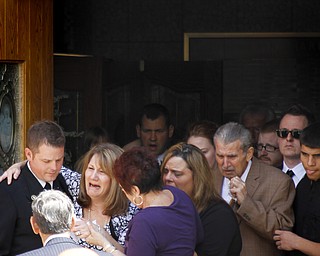 MADELYN P. HASTINGS | THE VINDICATOR
Mourners leave St. Vitus Church in New Castle after the funeral service for Shenango Township Police Officer William “Jerry” McCarthy outside of St. Vitus Church on May 8, 2013. McCarthy was killed by Kylee Barletto in a car chase on May 2, 2013.