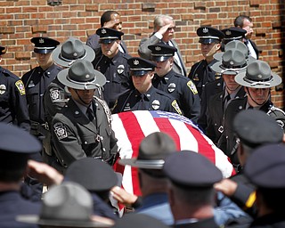 MADELYN P. HASTINGS | THE VINDICATOR
Pennsylvania State Police Troopers carry the casket of Shenango Township Police Officer William “Jerry” McCarthy outside of St. Vitus Church on May 8, 2013. McCarthy was killed by Kylee Barletto in a car chase on May 2, 2013.