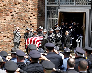 MADELYN P. HASTINGS | THE VINDICATOR
Pennsylvania State Police Troopers carry the casket of Shenango Township Police Officer William “Jerry” McCarthy outside of St. Vitus Church on May 8, 2013. McCarthy was killed by Kylee Barletto in a car chase on May 2, 2013.