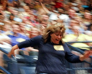 MADELYN P. HASTINGS | THE VINDICATOR
A contestant, Patricia from Youngstown, runs to the stage to play the game during the 'Price Is Right Live' show at the Covelli Centre on May 8, 2013.