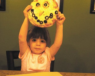 Sophia Testa shows off her work of art.