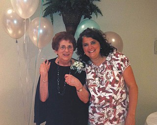 Pamela Pasquale and her mother, Janet Rozzo. Pamela says ÒIt brings a smile to my face just thinking of childhood memories of days sitting ÒIndian-styleÓ on our yellow-gold linoleum floor waiting for my mom to join us for a game of jacks Ñ with real metal jacks and a red rubber ball.