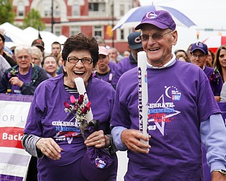 MADELYN P. HASTINGS | THE VINDICATOR
Relay for Life king and queen, Sylvia Hoso of Warren and Jim Gintert of Champion start off the first lap of the Relay for Life in Warren. The Warren Relay for Life, the largest in the state in terms of money raised, was held on Courthouse Square in downtown Warren on May 10, 2013.