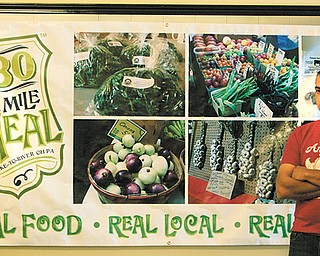 Carl Angiuli of Angiuli’s Farm Market on Route 46 south of Canfield talks about fruits, vegetables and herbs grown at the family-run farm.