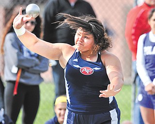 Fitch junior Gabby Figueroa puts the shot during Tuesday’s All-American Conference American Division meet at Poland High School. Figueroa won the shot and discus to help the Falcons win the team title.