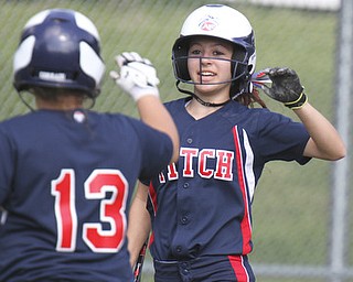 William D. Lewis\The Vindicator Fitch's Cali Mikovich(3) gets congrats from Alex Corradi(13) after scoring during 2nd inning of game with Kent. Fitch won 4-2..