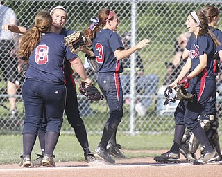 William D. Lewis\The Vindicator.Celebrating after a 4-2 win over Kent Wed 5/15/13 at home are Fitch's l-r Alex Franken(8), Gabby Butcher(11), Cali Mikovich(3) and Nicholette Zordich(4).
