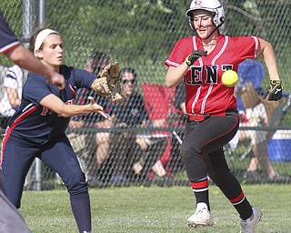 William D. Lewis\The Vindicator.Kent's Mary Gavriloff(15) is out at 1rst as Fitch first baseman Gabby Butcher(11) makes the catch during Wed game at Fitch. Falcons won 4-2.