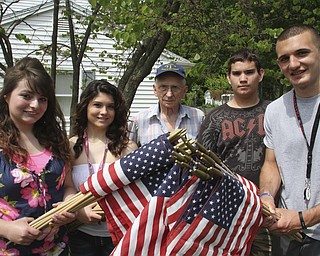 William D. Lewis\The Vindicator
Posing with flags to be placed on Austintown streets are from left: Lynnette Seebacher, Laura Wilson, Meter Fromel, Ricky Ferry and Camran Rezapourian. Fromel is an 85 year old MArine vet who enlisted the help of studnetsw in Austintown Fitch NHS students.