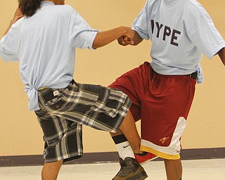 ROBERT K. YOSAY | THE VINDICATOR
Lajuan Thomas (ball cap #2 shirt) and - Troy Blackmon -( Red Shorts )Kathy Hammond David Hight
The Return of the All-City Variety Show runs from 6 to 10 p.m. at East High School. It’s a fund-raiser for the intramural third through sixth grade elementary school sports program that begins this fall. The sports program is a partnership between the city schools and Finer Things Academy Inc