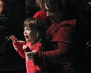 MADELYN P. HASTINGS | THE VINDICATOR
Jamie Smith of Lisbon holds her daughter Reagan Smith, 3, while she reacts after seeing Elmo from Sesame Street during their show at the Covelli Centre on May 25, 2013. They will have two more shows Sunday.