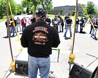 Reverend Jeff Baker gives his blessing of bikes and riders Saturday afternoon at Christ Episcopal Church in Warren.