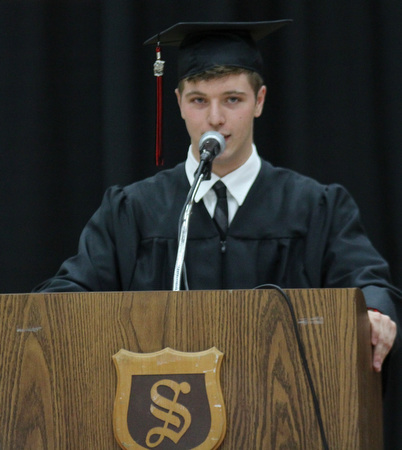 IMG 9199: ÊClass president David Dilla gives a speech titled "I'll only take a minute" during his classes commencement on Sunday at the Struthers Field House. ÊDustin Livesay Ê| ÊThe Vindicator Ê5/26/13 ÊStruthers High School.