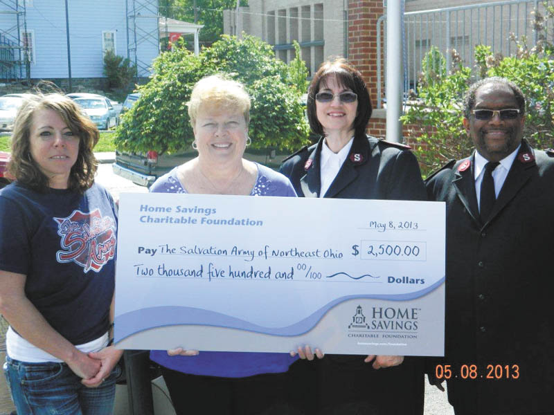 SPECIAL TO THE VINDICATOR
Home Savings Charitable Foundation has donated $2,500 to the Salvation Army of Northeast Ohio to support the emergency food program in East Liverpool. From left are Megan Bennett, office administrator/case manager, Salvation Army; Judy Smit, senior branch manager, Home Savings; and Majs. Stella McGuire and Douglas McGuire, pastors, Salvation Army. Federal funds and private donors support the emergency food program. For 
information on the Salvation Army of Northeast Ohio call 216-861-8185 or visit www.use.salvationarmy.org.
