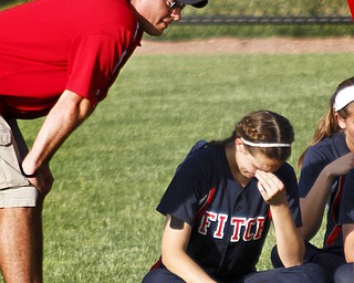 MADELYN P. HASTINGS I THE VINDICATOR
Coaches talk with the Fitch girls after they lost their game against Medina 5-3 at the University of Akron on May 30, 2013.