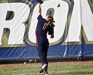 MADELYN P. HASTINGS I THE VINDICATOR
Fitch's Alana Callahan (1) misses the ball during their game against Medina at the University of Akron on May 30, 2013. Fitch lost to Medina 5-3.