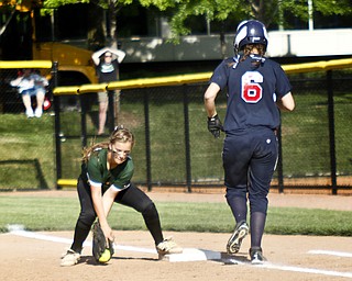 MADELYN P. HASTINGS I THE VINDICATOR
Fitch's Mercedes Pratt (6) doesn't make it to the base in time as Medina's Madison Loftis (00) tags her out on first base during their game at the University of Akron on May 30, 2013. Fitch lost to Medina 5-3.